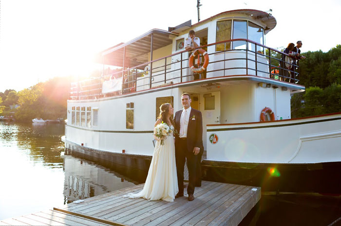 bride and groom in front of Peerless II